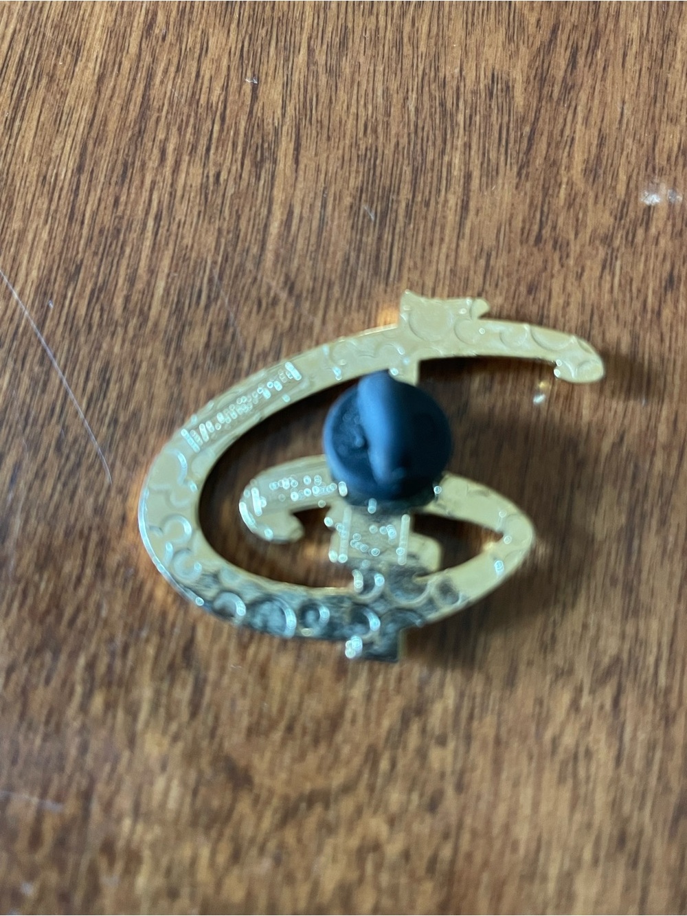 Disney Gold Tone Swirl Logo Pin - Picture 2 of 2